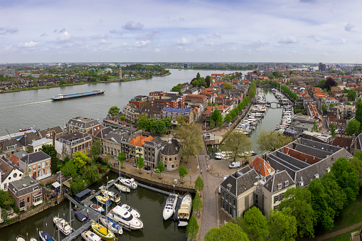 Panoramic cityscape of the city of Dordrecht from the Grote Kerk tower on a spring day