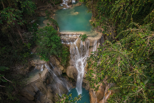 Aerial Drone Shot Of The Amazing Kuang Si Waterfalls In Luang Probang Laos. The Waterfalls Are A Favorite Side Trip For Tourists In Luang Prabang. Main Fall Has A Drop Of 60 Meters.
