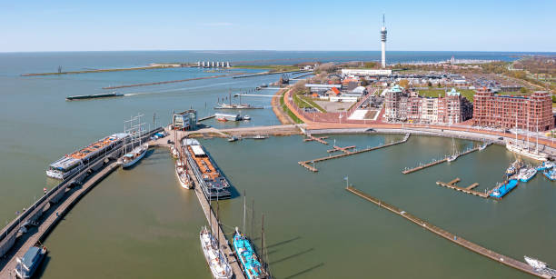 Aerial panorama from the city Lelystad in the Netherlands with the VOC ship in the harbor stock photo