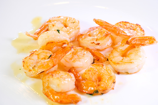 shrimps on a white background ofresh shrimps served on plate boiled peeled shrimp prawns cooked in the seafood restaurant