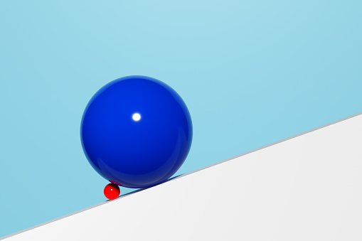 Business support, insurance, assistance or aid. Crisis management and prevention. Small sphere blocking the large sphere on a downslope. 3D render.