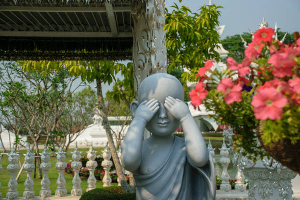 istock Light Greystone Child Buddha from White Temple in Chiang Rai 1488170795