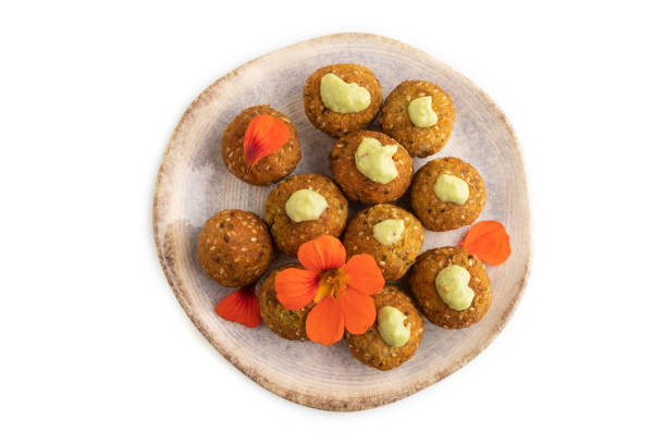 istock Falafel with guacamole isolated on white. Top view. 1488178506