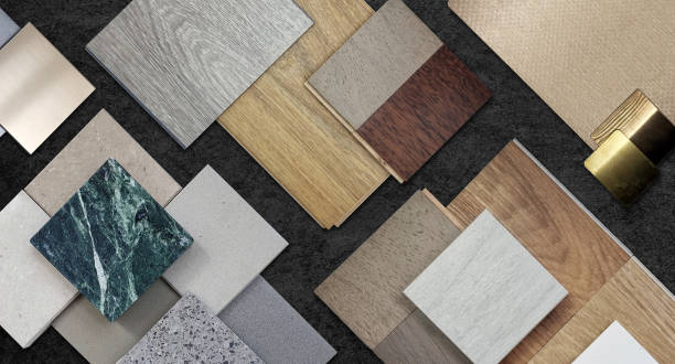 istock home interior material samples selection contains brushed stainless, metallic laminated, wooden vinyl flooring tiles, laminated tiles, marble stone, stone tiles placed black stone table background. 1488184604