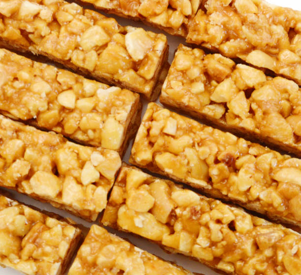 istock Honey bars with peanuts, sesame and sunflower seeds isolated 1488187052