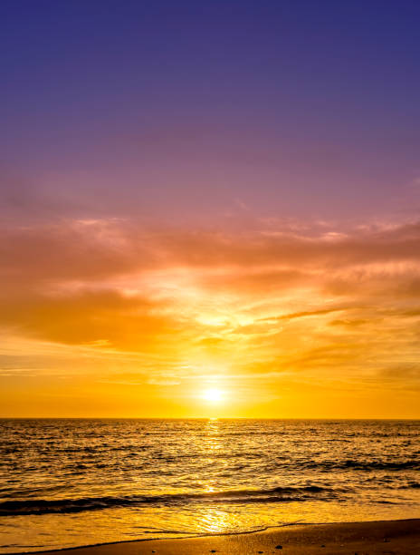 Orange color seascape view during sunset in Sarasota, Florida