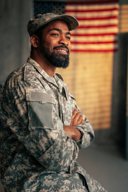 istock Cheerful military officer indoors. 1488191960