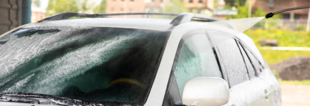 istock Washing a car at a car wash 1488194088
