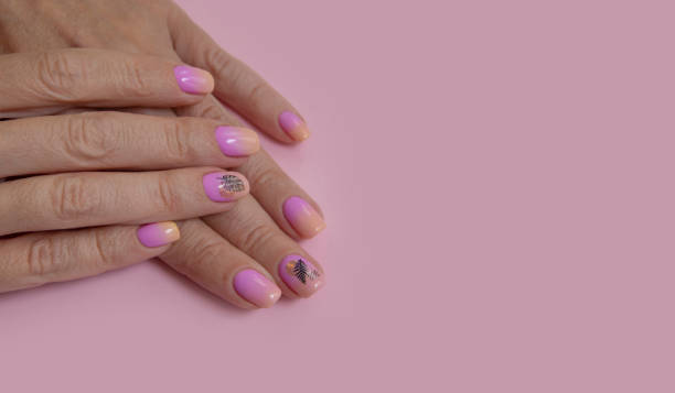 istock Female hand beautiful manicure on a colored background 1488197493