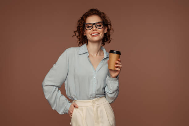 istock Beautiful emotional woman drinking coffee 1488200036