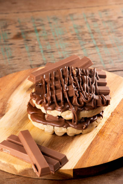 istock double waffle with chocolate coating on chocolate bars on rustic wooden table from above 1488204664