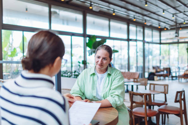istock A lobby meeting between two women for a job interview 1488206536