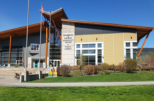 Exterior view of small town Community Centre and Library. Modern Architecture.  Pemberton is a small mountain town North of Vancouver BC.  Near Whistler British Columbia. No people in image