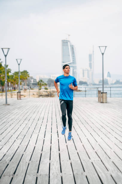 istock Jogging by the sea 1488206976