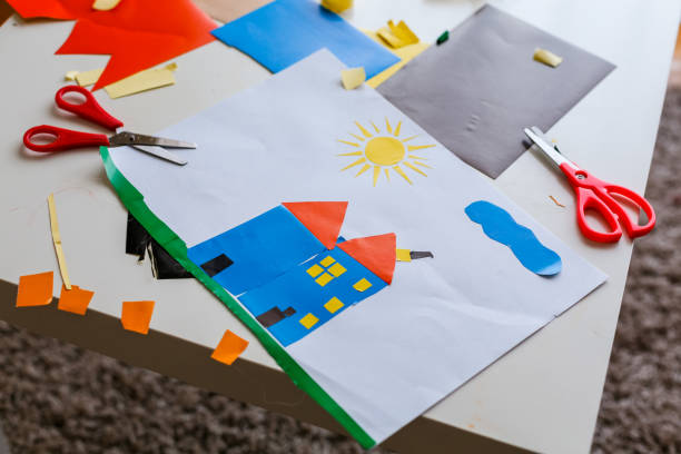 istock Crafted child's art product left on a table 1488208348