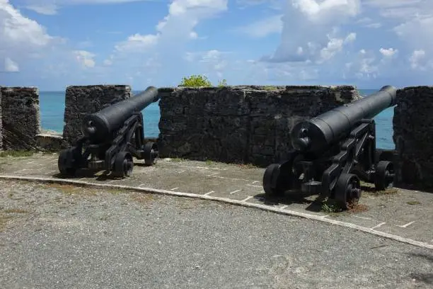 Photo of Old cannons in fortress on tropical island, Fort St. Catherine's, concept: history, defence