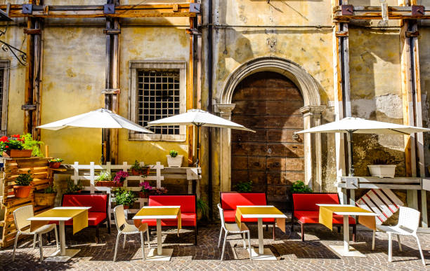 istock sidewalk restaurant in italy 1488214702