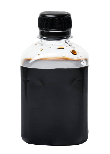 istock Soy sauce in a transparent plastic bottle on a white isolated background 1488221699