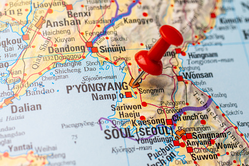 Red map pin on a map of Pyongyang.
