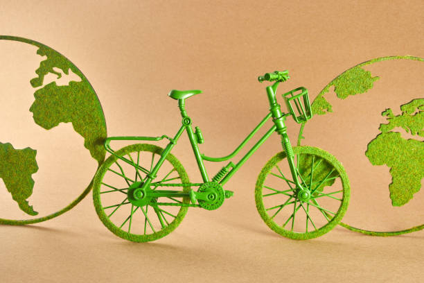 Eco bicycle on green background. Sustainable transport copy space banner. 3D rendering.