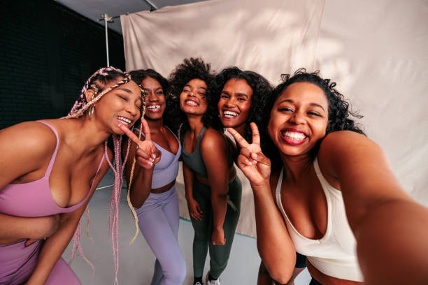 istock Athletic friends taking selfie point of view. 1488224312