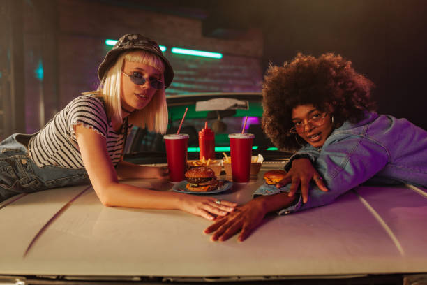 istock Girls bonding with takeout outdoors. 1488224849