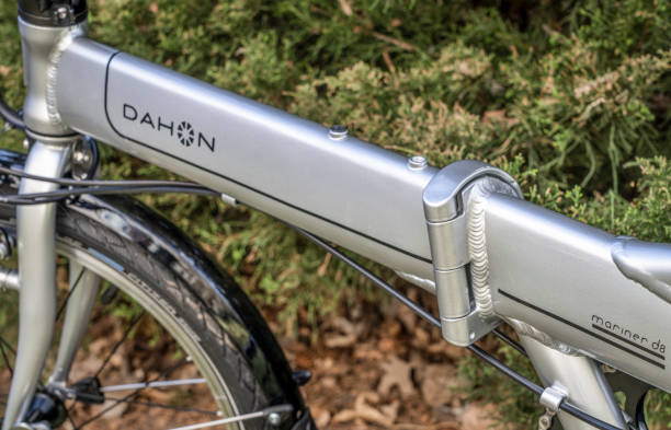 A detail of a popular, lightweight, folding bike, Dahon Mariner D8 with aluminum frame. Fort Collins, CO, USA - May 7, 2023: A detail of a popular, lightweight, folding bike, Dahon Mariner D8 with aluminum frame. developing 8 stock pictures, royalty-free photos & images