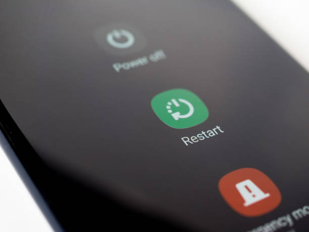 istock power off and restart buttons on phone 1488228383