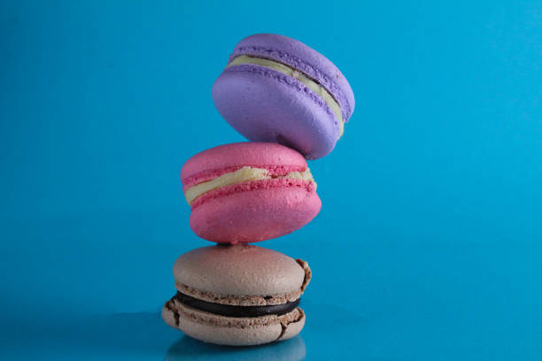 istock flying flying levitating food macaroon on a blue background with room for text 1488235416