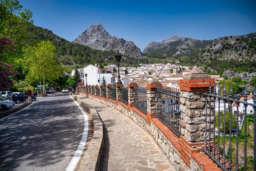 Grazalema, Spain - April 9, 2023: City medieval streets and white homes on a beautiful sunny day.
