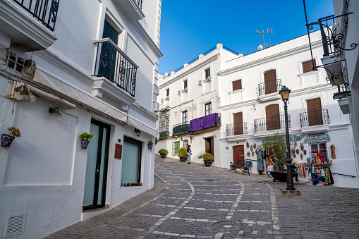 Vejer de la Frontera, Spain - April 9, 2023: City streets and white home on a sunny day, Andalusia