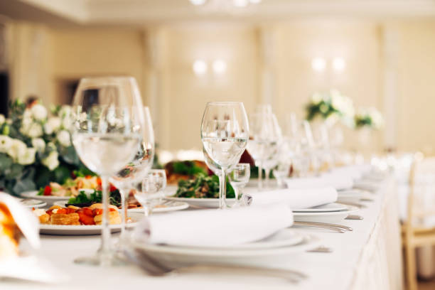 istock closeup of empty wineglasses on serving table with dishes. weddi 1488244300