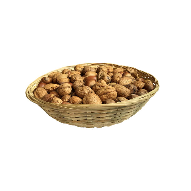 istock Dried nuts in wicker bowl isolated object top view, soft focus clipping path, pistachio, hazelnuts, walnuts, healthy raw food organic diet concept 1488248010