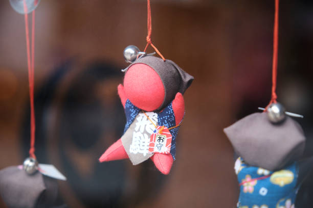 Sarubobo doll, Japanese amulet, in the town of Takayama in Gifu, Japan. stock photo