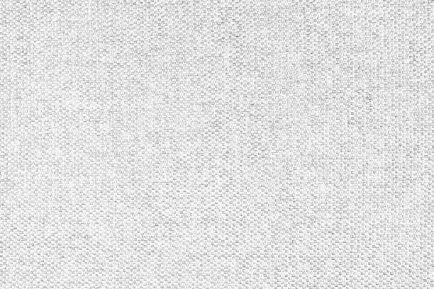 istock Close up texture of white coarse weave upholstery fabric. Decorative textile background 1488248890