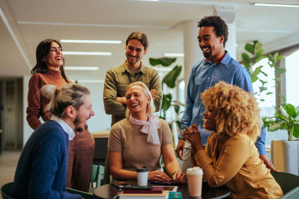 istock Cheerful businesspeople informal meeting. 1488251348