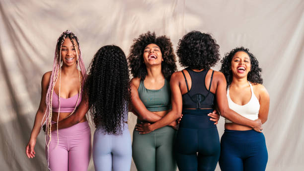 istock Athletic women standing together indoors. 1488251397