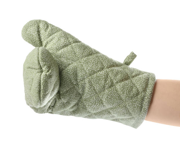 istock Chef in oven glove on white background, closeup 1488254076