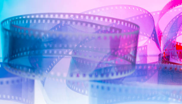 istock abstract colorful background with film strip 1488254749