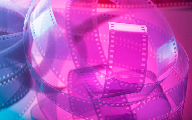 istock abstract colorful background with film strip 1488254764