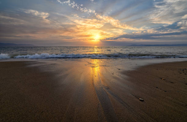 istock Sunset Ocean Sunshine Beach Landscape 1488254797