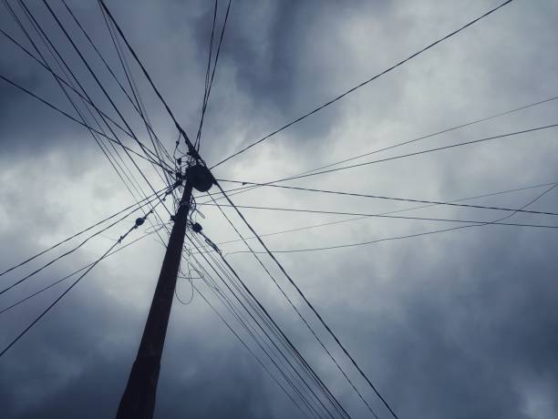 istock Telephone pole by the road 1488258626