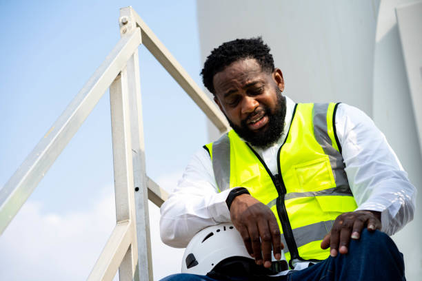 Tired stress worker sweat from hot weather in summer working, Black African race people. Tired stress worker sweat from hot weather in summer working, Black African race people. heat stress stock pictures, royalty-free photos & images