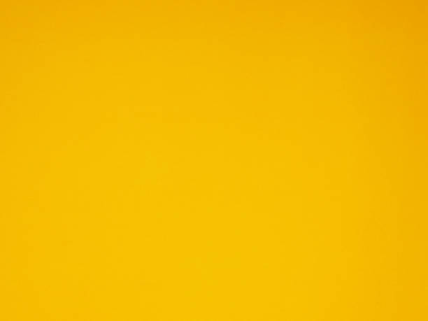 istock Blank yellow paper surface space for your image, text, art, design, and composition for banner, wallpaper, backdrop. 1488262824