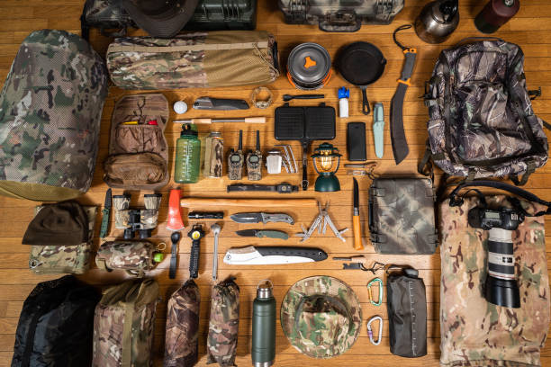 istock Camouflage military themed camping or bugout bag gear flat lay 1488266335