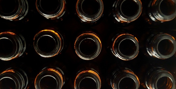 closeup photo of brown medicine bottle