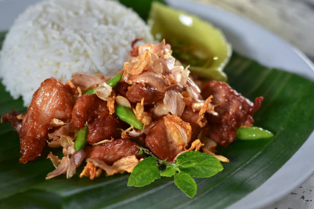 istock Thai style pork basil stir fried food 1488271931