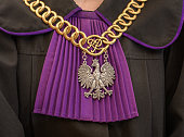 A judge of the Republic of Poland in a judge's gown and a chain with an eagle