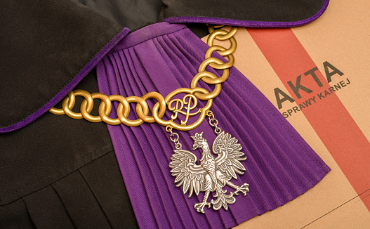 A judge's robe in Poland, criminal case files and a judge's chain
