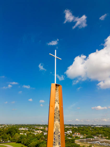 istock Photo of a cross on blue sky 1488277538